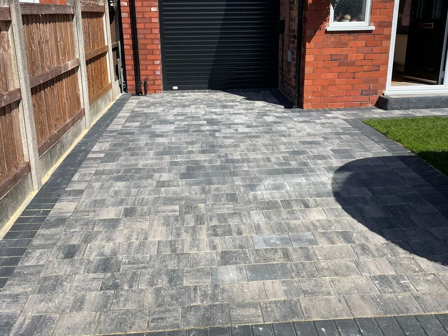 Grey block-paved driveway laid by T&T Driveways